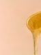 sugaring-paste-running-down-a-lollypop-stick