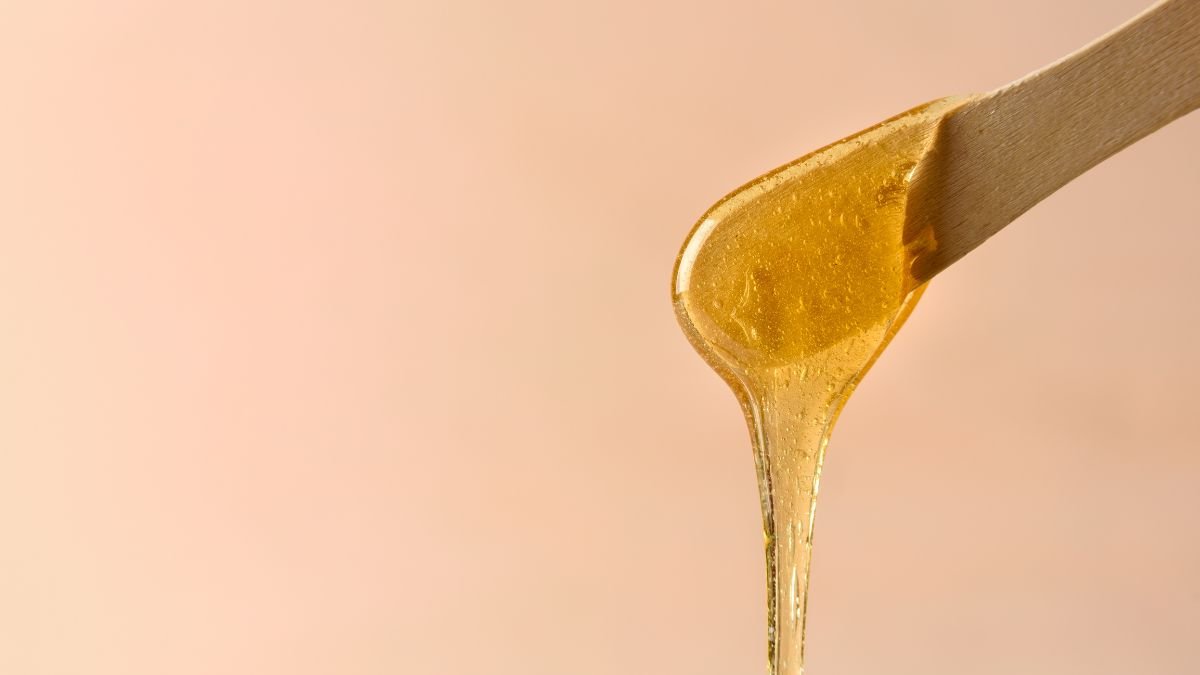 sugaring-paste-running-down-a-lollypop-stick